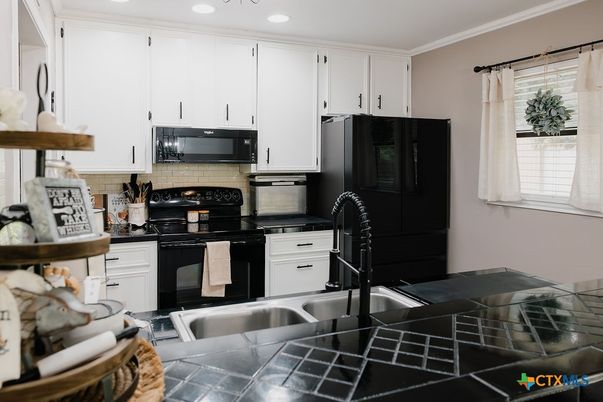 Interior, Kitchen, Recessed Lighting, Tile Countertops