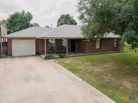 Attached, Backyard, Exterior, Facade, Brick Facade, Ranch