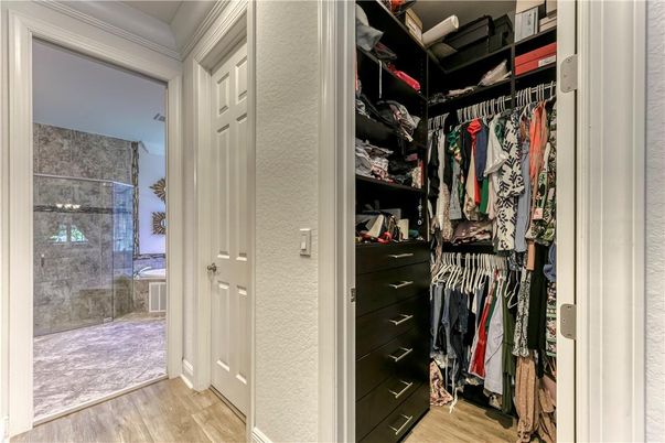 Bathroom, Glass Shower, Interior, Walk-in Closets, Wood Texture Flooring