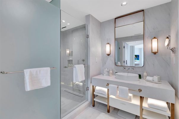 Bathroom, Dual Sink Vanities, Glass Shower, Interior, Marble Walls, Recessed Lighting