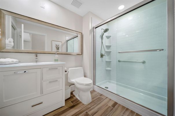 Bathroom, Glass Shower, Interior, Recessed Lighting, Wood Texture Flooring