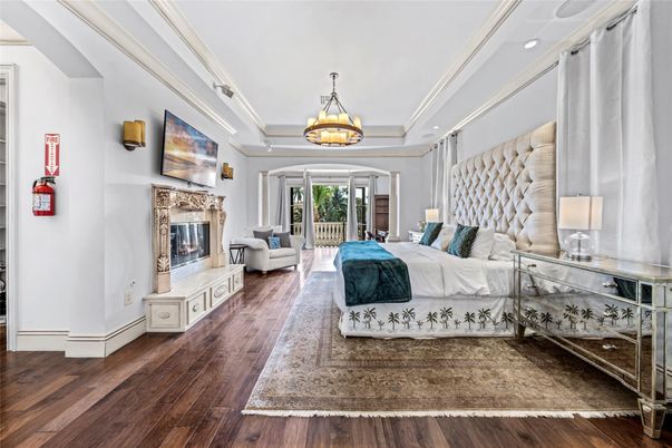 Bedroom, Fireplace, Interior, Pendant Lights, Recessed Lighting, Wood Texture Flooring