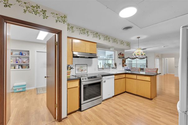 Interior, Kitchen, Pendant Lights, Recessed Lighting, Stainless Steel Appliances, Wood Texture Flooring