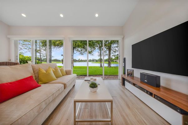 Fireplace, Interior, Living room, Recessed Lighting, Water, Wood Texture Flooring