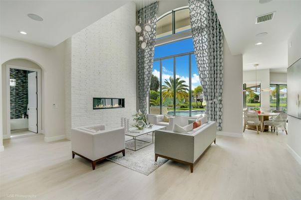 Dining room, Fireplace, Interior, Living room, Pendant Lights, Recessed Lighting, Wood Texture Flooring