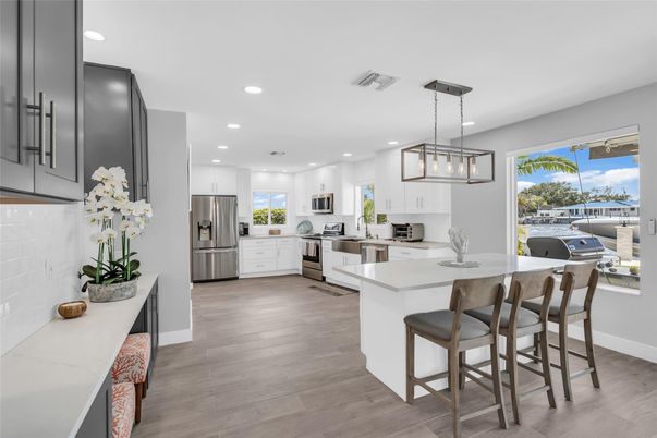 Interior, Kitchen, Pendant Lights, Recessed Lighting, Stainless Steel Appliances, Wood Texture Flooring