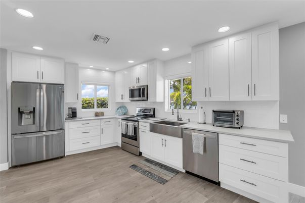 Interior, Kitchen, Recessed Lighting, Stainless Steel Appliances, Wood Texture Flooring
