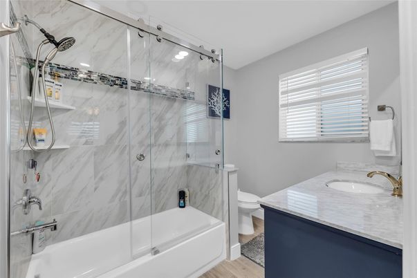 Bathroom, Glass Shower, Interior, Marble Walls, Wood Texture Flooring
