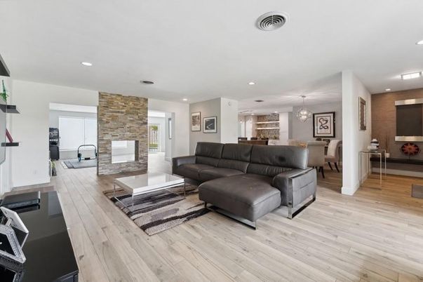 Dining room, Fireplace, Interior, Living room, Pendant Lights, Recessed Lighting, Stone Walls, Wood Texture Flooring
