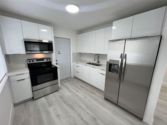 Interior, Kitchen, Recessed Lighting, Stainless Steel Appliances, Wood Texture Flooring