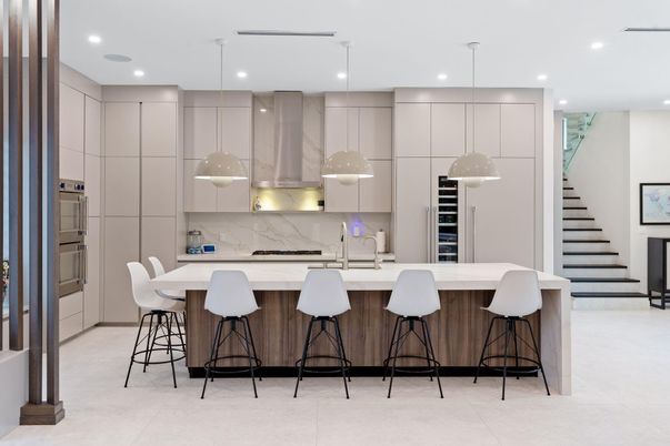 Interior, Kitchen, Marble Walls, Pendant Lights, Recessed Lighting, Stainless Steel Appliances
