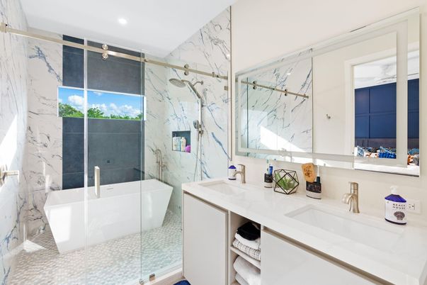 Bathroom, Dual Sink Vanities, Free Standing Baths, Glass Shower, Interior, Marble Walls, Recessed Lighting