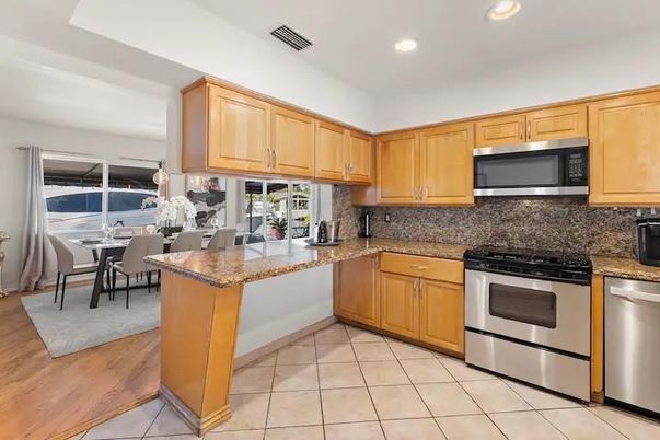 Dining room, Interior, Kitchen, Recessed Lighting, Stainless Steel Appliances, Wood Texture Flooring
