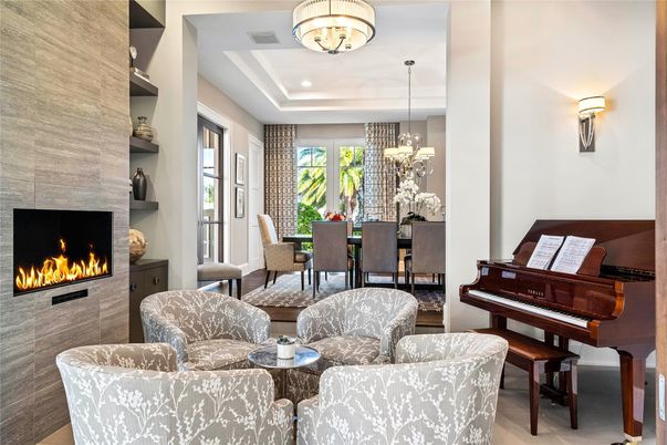 Chandelier, Dining room, Fireplace, Interior, Living room, Pendant Lights, Piano, Recessed Lighting