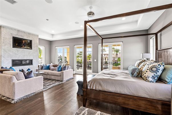 Bedroom, Fireplace, Interior, Recessed Lighting, Stone Walls, Wood Texture Flooring