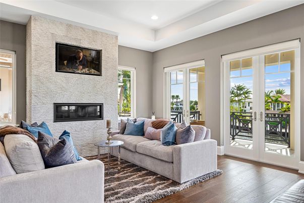 Fireplace, Interior, Living room, Recessed Lighting, Stone Walls, Wood Texture Flooring