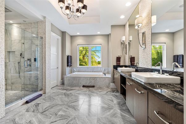 Bathroom, Chandelier, Dual Sink Vanities, Glass Shower, Interior, Marble, Marble Walls, Recessed Lighting