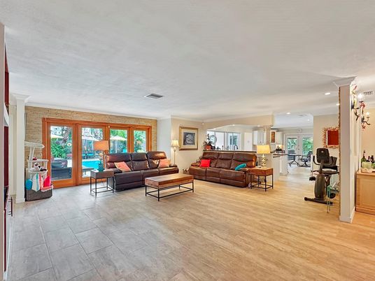 Fireplace, Interior, Living room, Recessed Lighting, Stone Walls, Wood Texture Flooring
