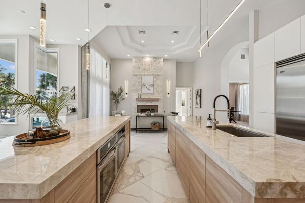 Fireplace, Interior, Kitchen, Living room, Marble, Pendant Lights, Recessed Lighting, Stainless Steel Appliances