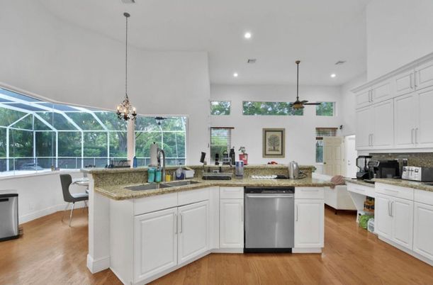 Dining room, Glass Ceilings, Interior, Kitchen, Pendant Lights, Recessed Lighting, Sun Room, Wood Texture Flooring