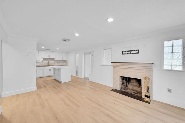 Empty room, Fireplace, Interior, Kitchen, Recessed Lighting, Wood Texture Flooring