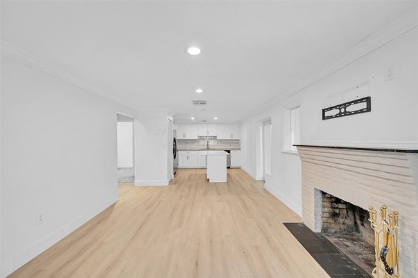Fireplace, Interior, Kitchen, Recessed Lighting, Wood Texture Flooring