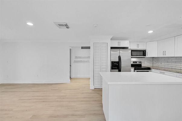 Interior, Kitchen, Recessed Lighting, Stainless Steel Appliances, Wood Texture Flooring