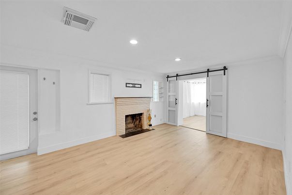 Empty room, Fireplace, Interior, Recessed Lighting, Wood Texture Flooring