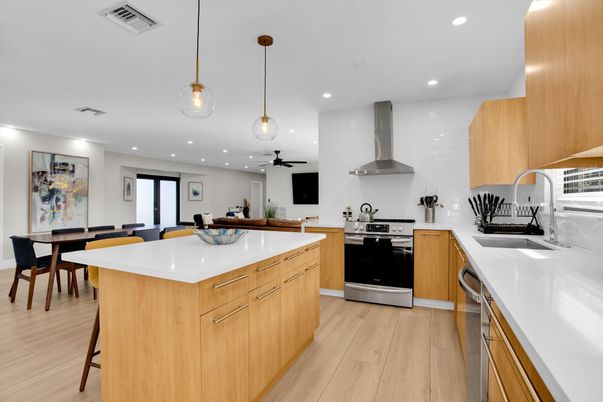 Dining room, Interior, Kitchen, Pendant Lights, Recessed Lighting, Stainless Steel Appliances, Wood Texture Flooring