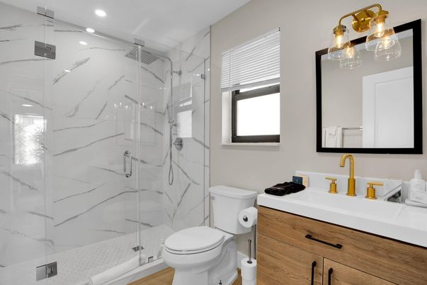 Bathroom, Glass Shower, Interior, Marble Walls, Recessed Lighting, Wood Texture Flooring