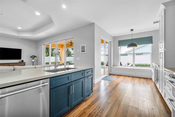 Interior, Kitchen, Pendant Lights, Recessed Lighting, Stainless Steel Appliances, Wood Texture Flooring