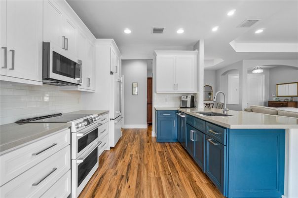 Interior, Kitchen, Recessed Lighting, Stainless Steel Appliances, Wood Texture Flooring