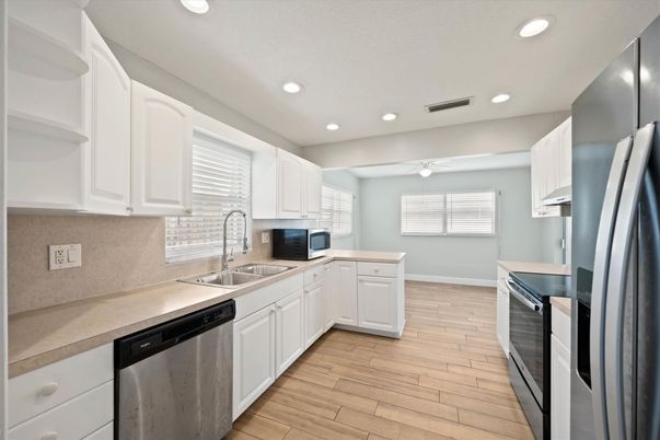 Interior, Kitchen, Recessed Lighting, Stainless Steel Appliances, Wood Texture Flooring