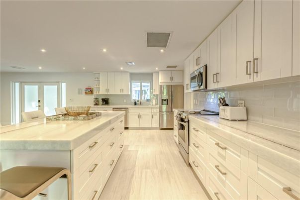 Interior, Kitchen, Recessed Lighting, Stainless Steel Appliances, Wood Texture Flooring