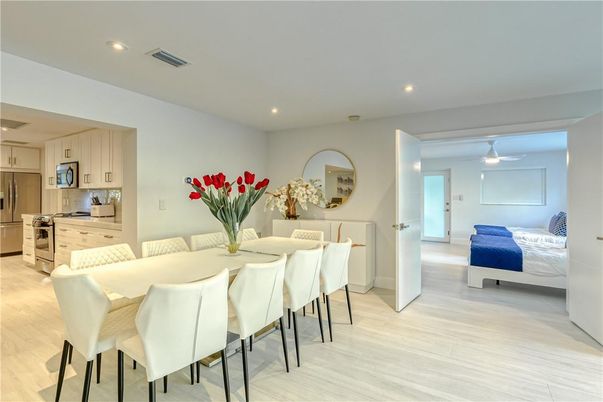Bedroom, Dining room, Interior, Kitchen, Pendant Lights, Recessed Lighting, Stainless Steel Appliances, Wood Texture Flooring