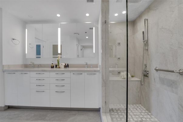 Bathroom, Dual Sink Vanities, Glass Shower, Interior, Marble Walls, Recessed Lighting