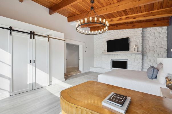 Chandelier, Fireplace, Interior, Living room, Stone Walls, Wooden Beams, Wooden Ceilings, Wood Texture Flooring