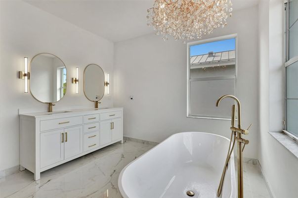 Bathroom, Chandelier, Dual Sink Vanities, Free Standing Baths, Interior, Marble