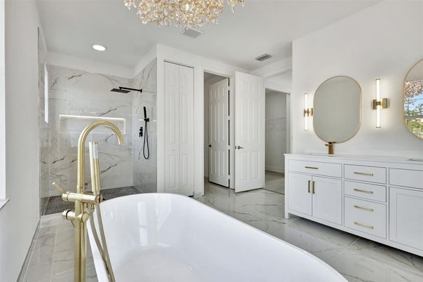 Bathroom, Dual Sink Vanities, Free Standing Baths, Interior, Marble, Marble Walls, Recessed Lighting