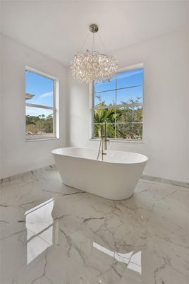 Bathroom, Chandelier, Free Standing Baths, Interior, Marble, Pendant Lights