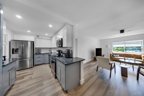 Dining room, Interior, Kitchen, Recessed Lighting, Stainless Steel Appliances, Wood Texture Flooring