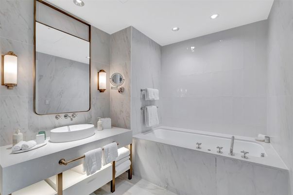 Bathroom, Dual Sink Vanities, Interior, Marble, Marble Walls, Recessed Lighting