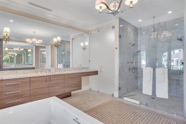 Bathroom, Chandelier, Dual Sink Vanities, Glass Shower, Interior, Marble, Marble Walls, Recessed Lighting