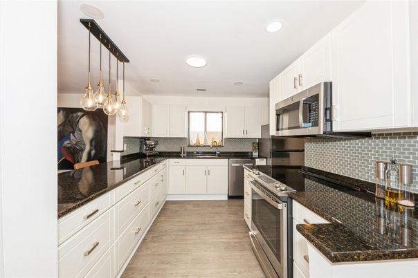 Interior, Kitchen, Pendant Lights, Recessed Lighting, Stainless Steel Appliances, Wood Texture Flooring