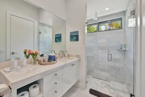 Bathroom, Dual Sink Vanities, Glass Shower, Interior, Marble Walls, Recessed Lighting