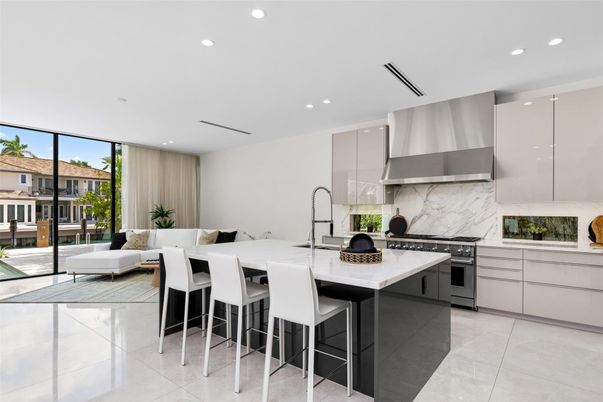 Interior, Kitchen, Marble Walls, Recessed Lighting, Stainless Steel Appliances