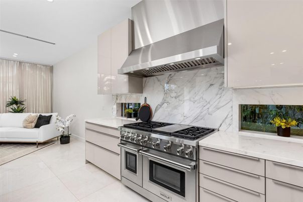 Interior, Kitchen, Marble Walls, Recessed Lighting, Stainless Steel Appliances