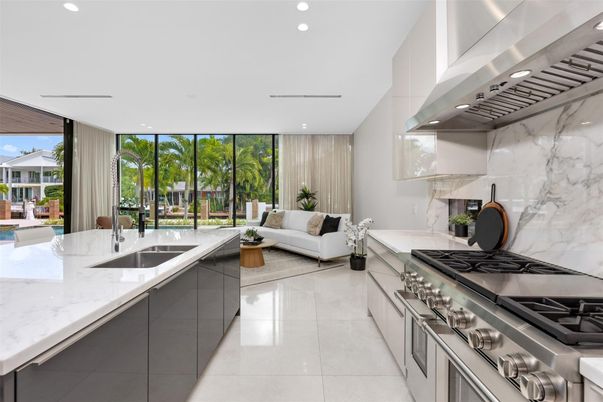 Interior, Kitchen, Living room, Marble Walls, Recessed Lighting, Stainless Steel Appliances