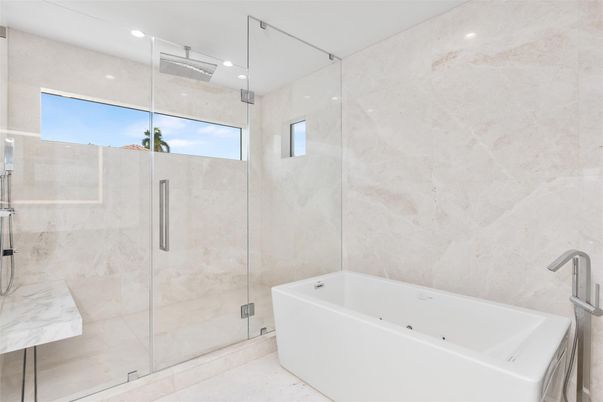 Bathroom, Free Standing Baths, Glass Shower, Interior, Marble Walls, Recessed Lighting