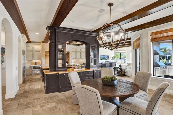 Chandelier, Dining room, Interior, Kitchen, Living room, Pendant Lights, Recessed Lighting, Stainless Steel Appliances, Wooden Beams